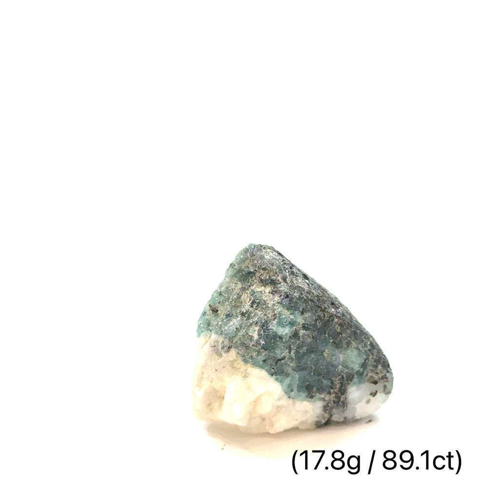 Raw Grade‑A Emerald Gemstone on white 17.8/89.1ct  overview