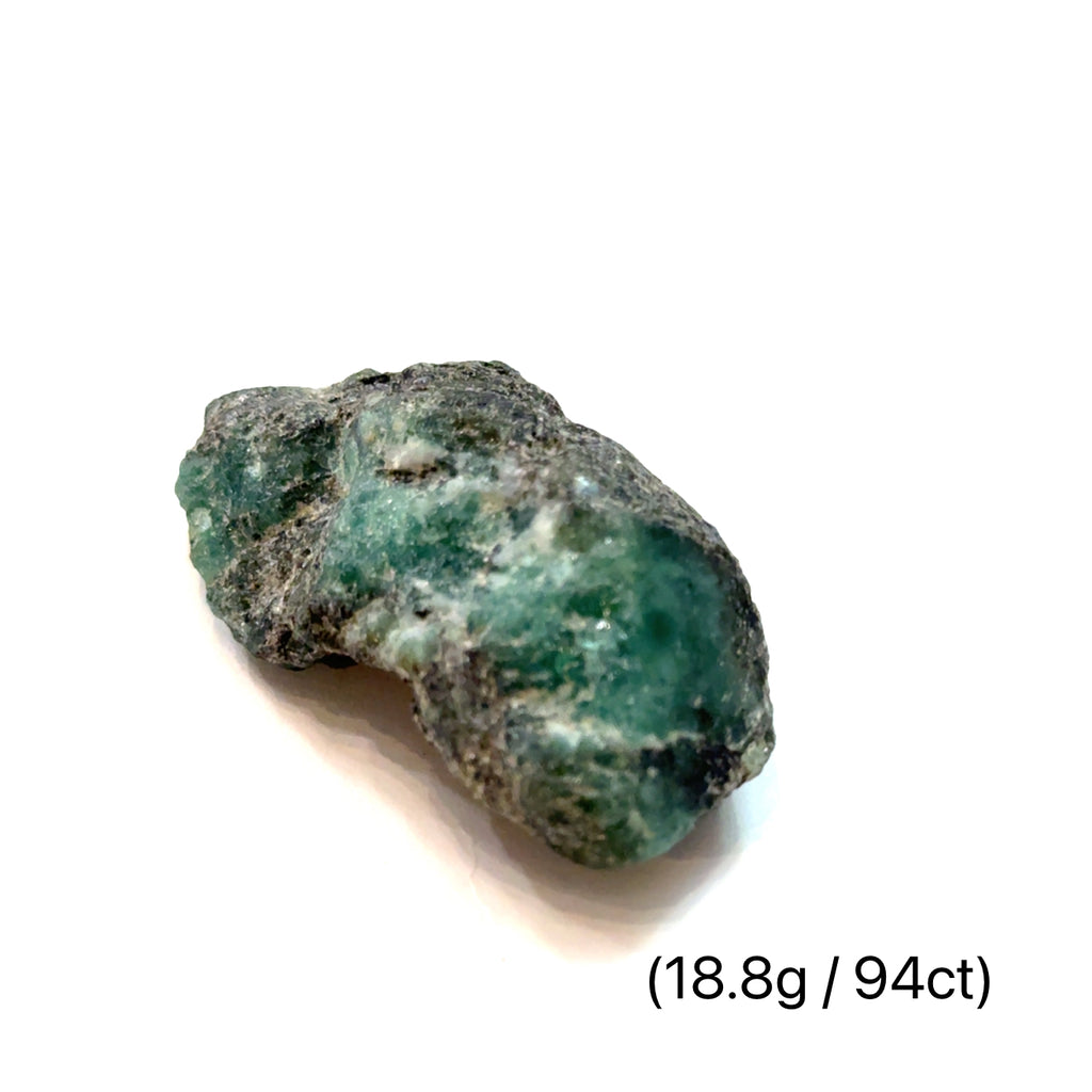 Raw Grade‑A Emerald Gemstone on white 18.8g/94ct  overview