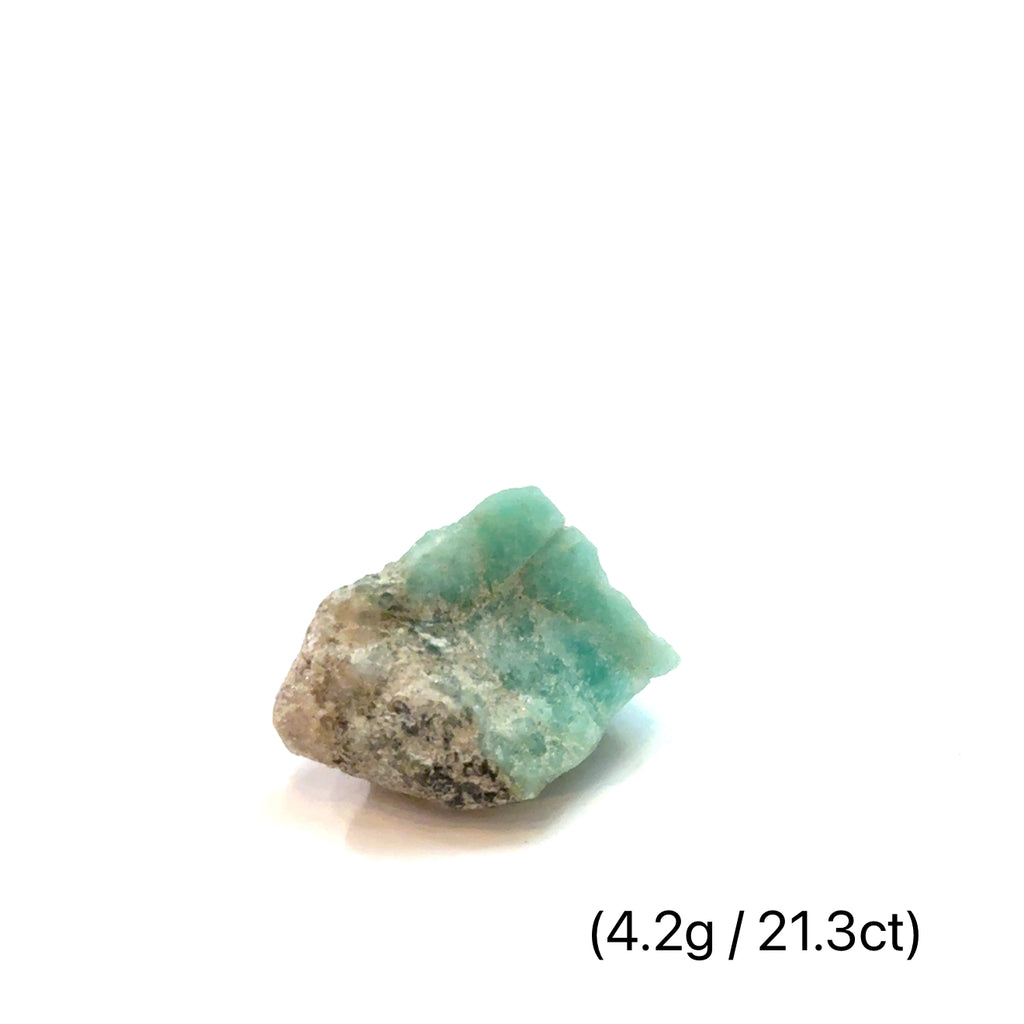 Raw Grade‑A Emerald Gemstone on white 4.2g/21.3ct overview