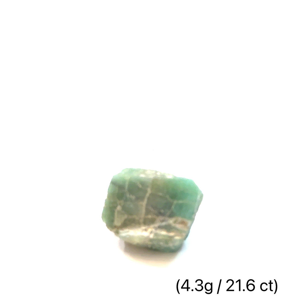 Raw Grade‑A Emerald Gemstone on white 4.3g/21.6ct overview