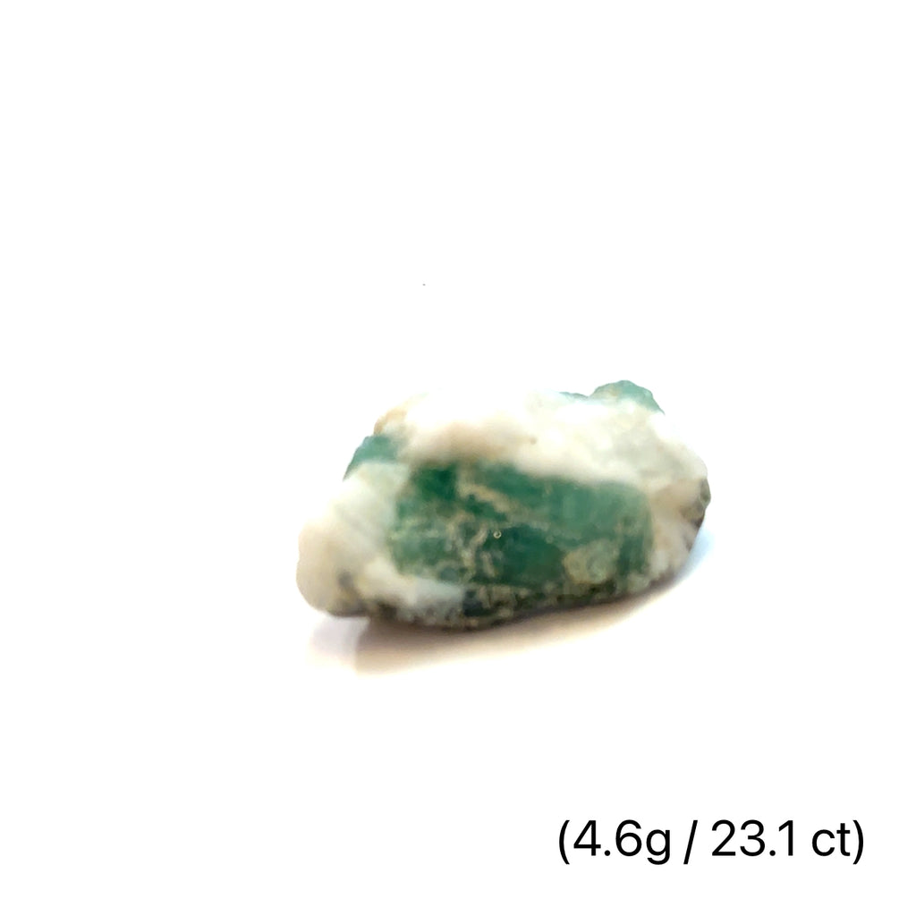 Raw Grade‑A Emerald Gemstone on white 4.6g/23.1ct overview