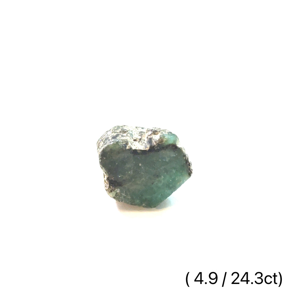 Raw Grade‑A Emerald Gemstone on white 49g/24.3ct overview