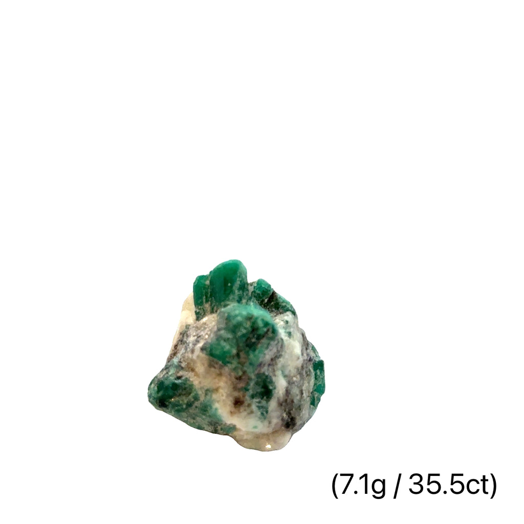 Raw Grade‑A Emerald Gemstone on white 7.1g/35.5ct  overview