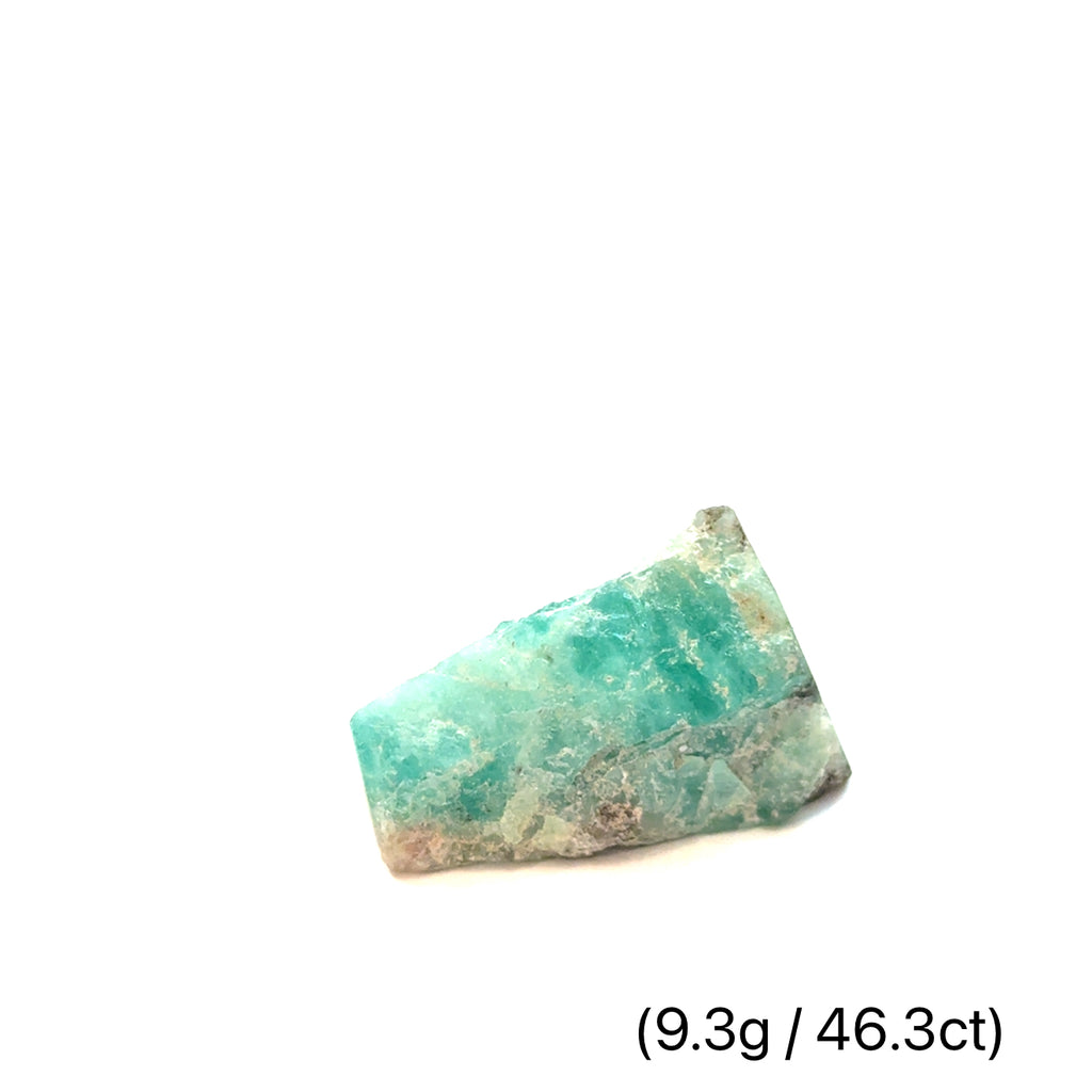 Raw Grade‑A Emerald Gemstone on white 9.3g/46.3ct  overview