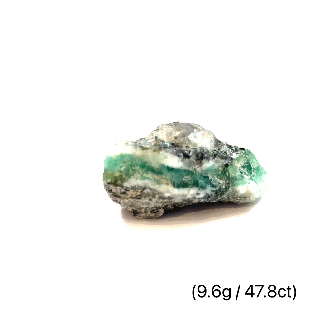 Raw Grade‑A Emerald Gemstone on white 9.6g/47.8ct  overview