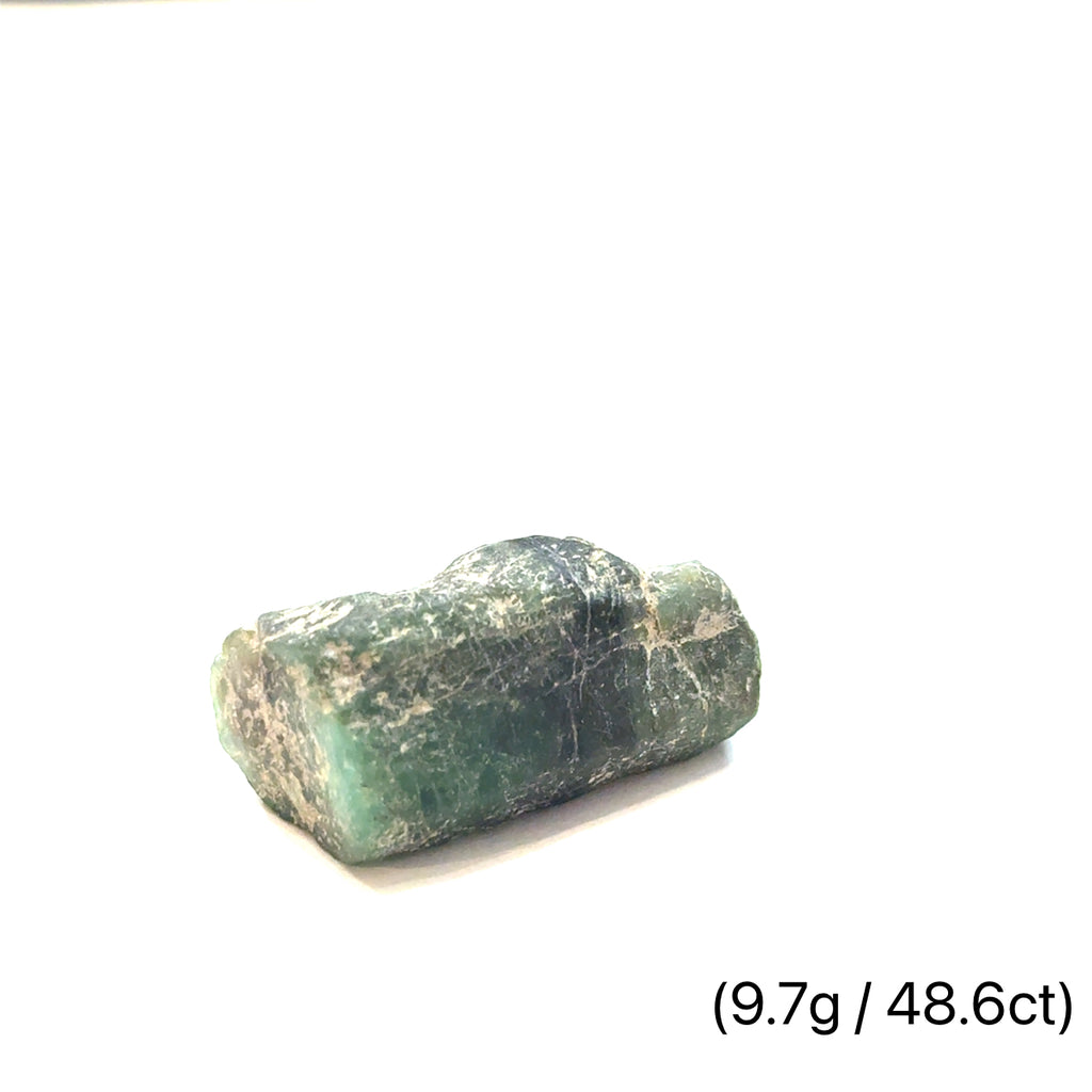 Raw Grade‑A Emerald Gemstone on white 9.7g/48.6ct  overview
