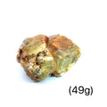 Raw Green Dermatoid Garnet Gemstone grouping  on white (49g) overview