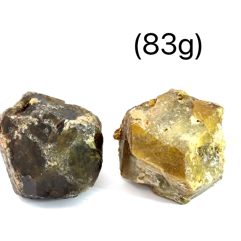 Raw Green Dermatoid Garnet Gemstone grouping  on white (83g) overview