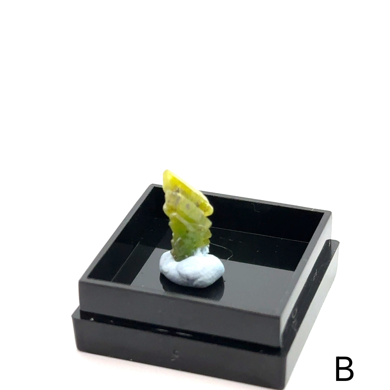 Raw Pyromorphite Gemstone in Perky Box B  on white front view