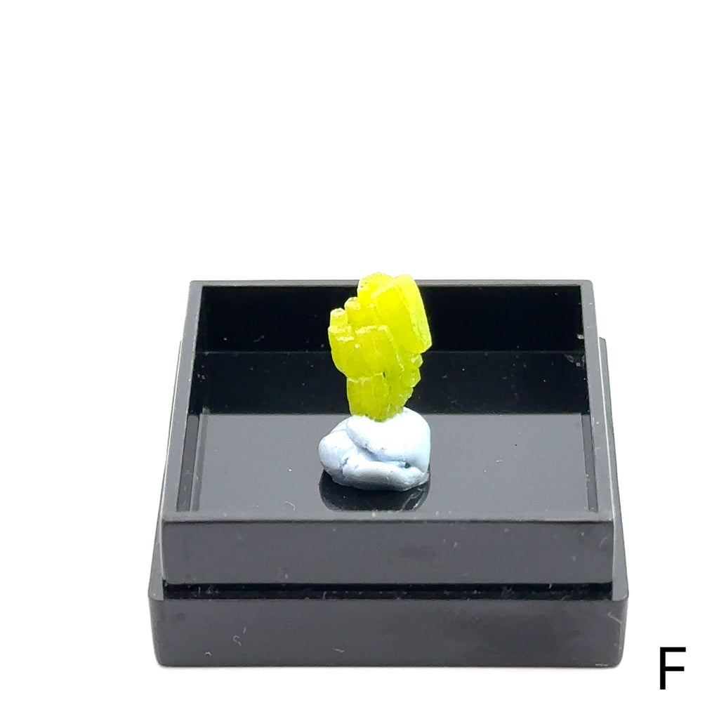 Raw Pyromorphite Gemstone in Perky Box F  on white front view