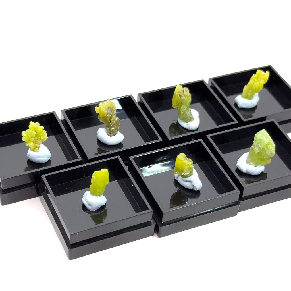 Raw Pyromorphite Gemstone in Perky Box  left on white overview