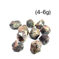 Raw Red Garnet Gemstone from Morocco grouping on white (4-6g)
