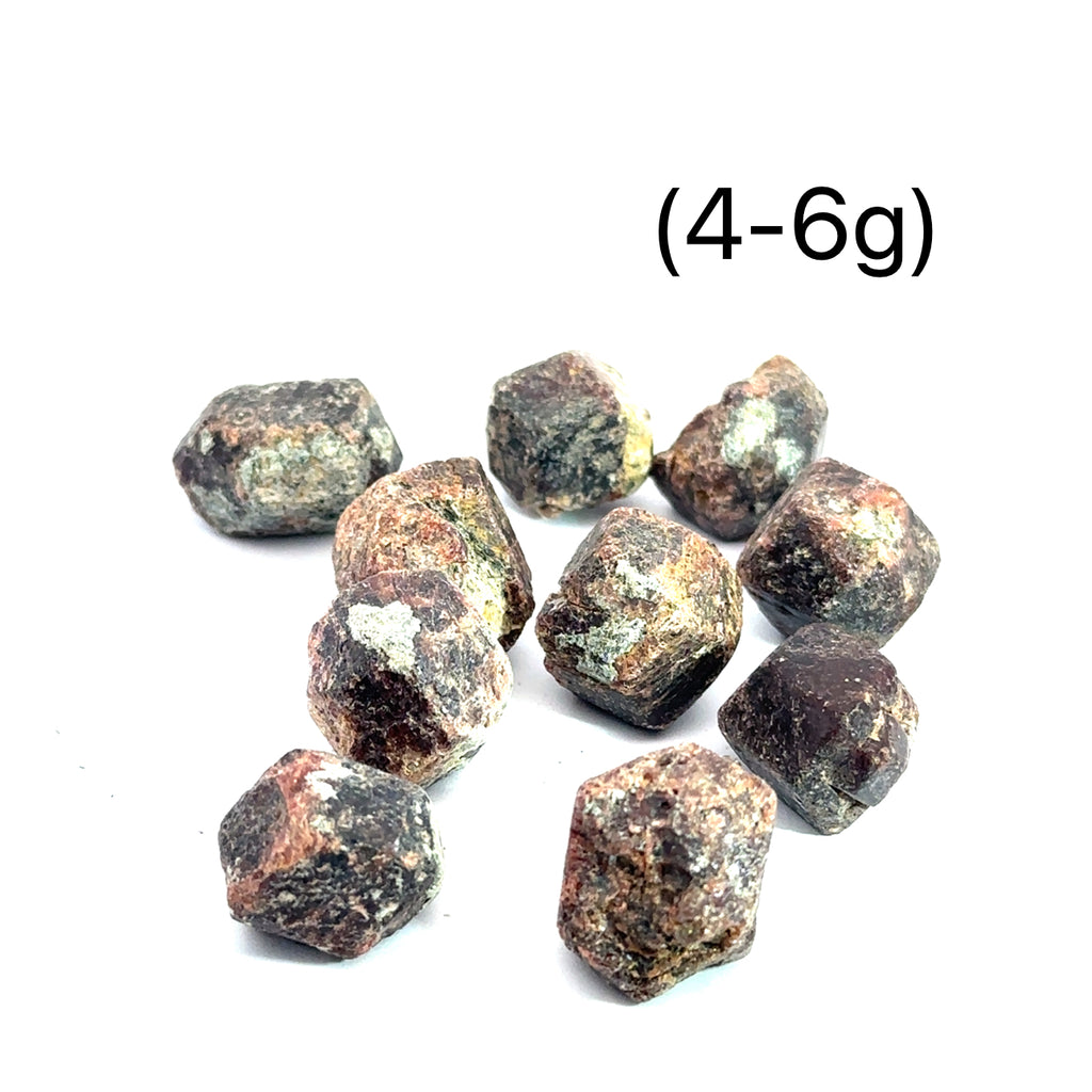 Raw Red Garnet Gemstone from Morocco grouping on white (4-6g)