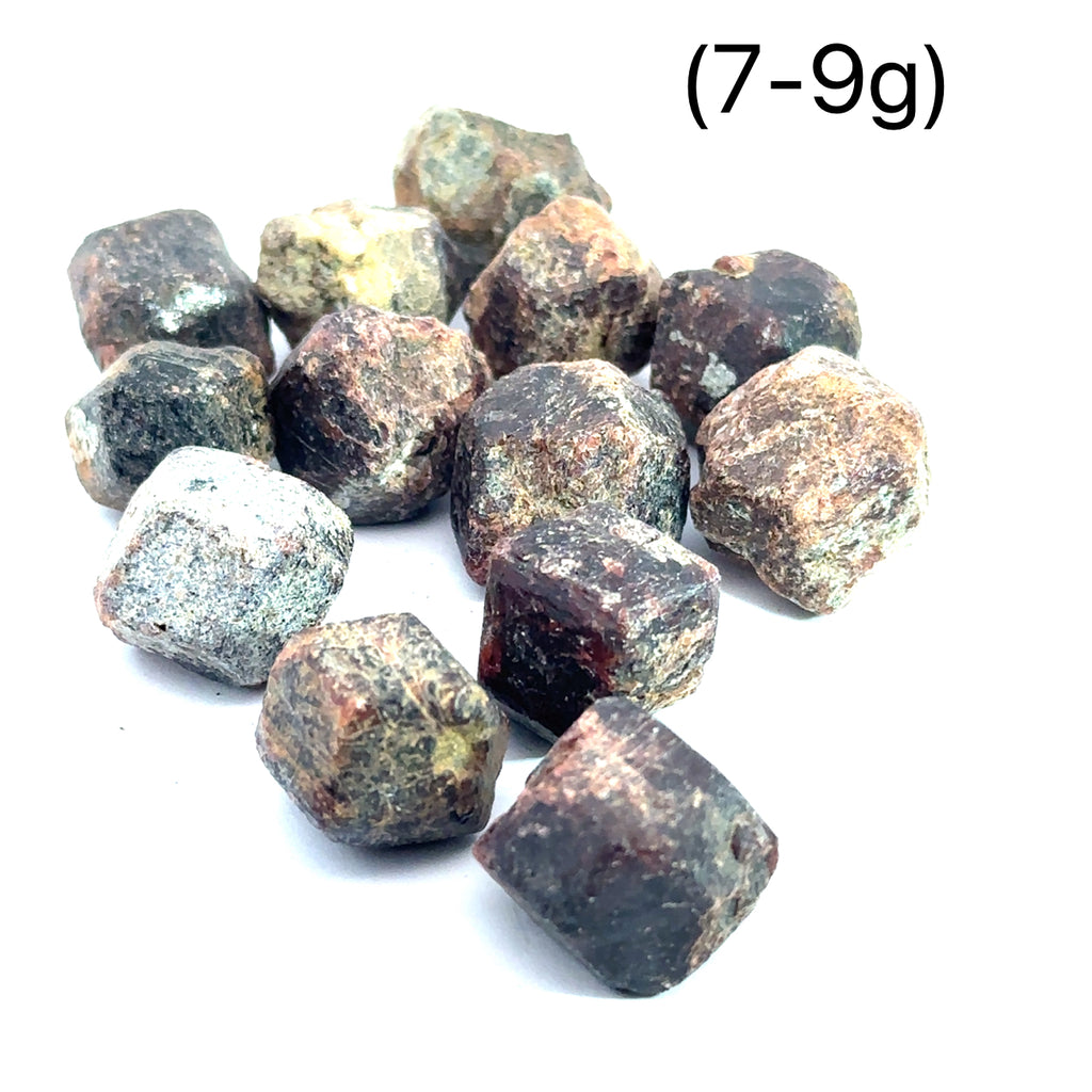 Raw Red Garnet Gemstone from Morocco grouping on white (7-9g) overview