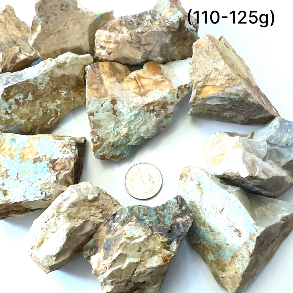 Raw Royston Turquoise Gemstone grouping (110-125g) on white 