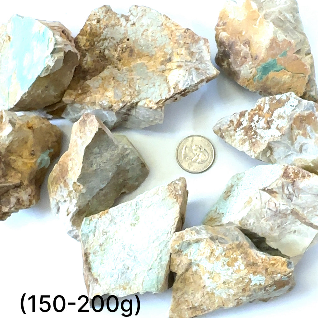 Raw Royston Turquoise Gemstone grouping (150-200g) on white center overview