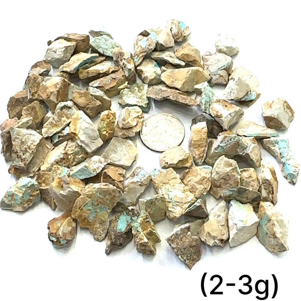Raw Royston Turquoise Gemstone grouping (2-3g) on white overview