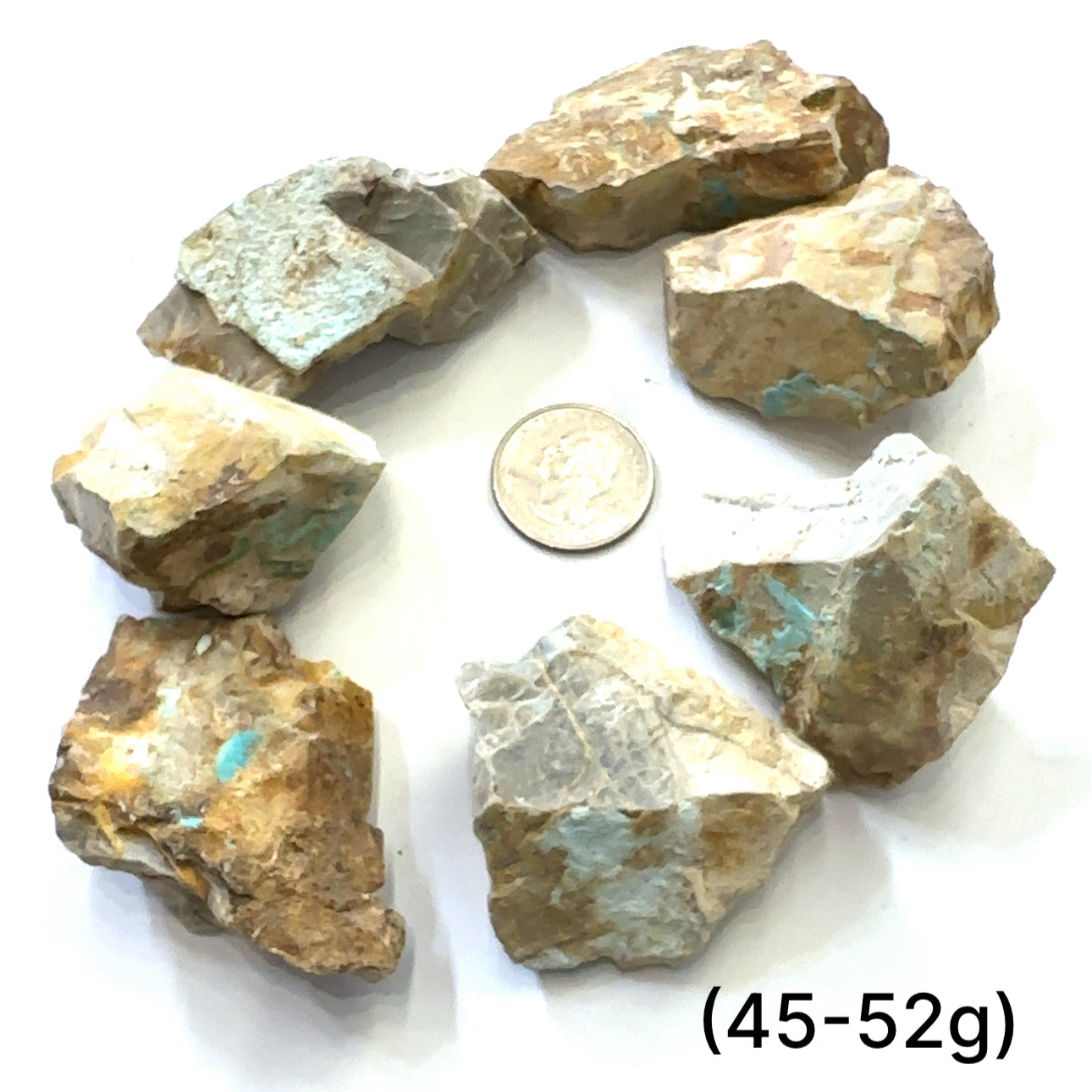 Raw Royston Turquoise Gemstone grouping (45-52g) on white overview