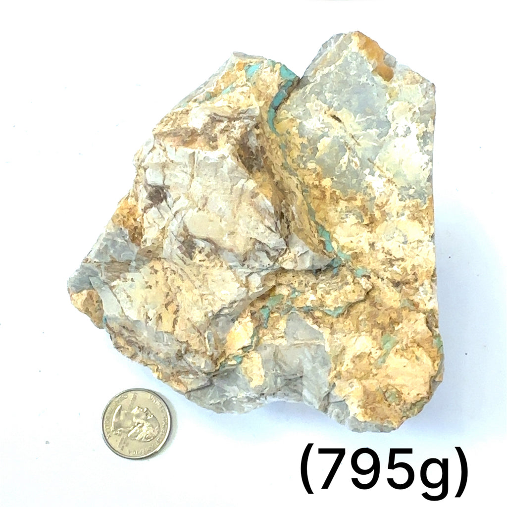 Raw Royston Turquoise Gemstone grouping (795g) on white center overview