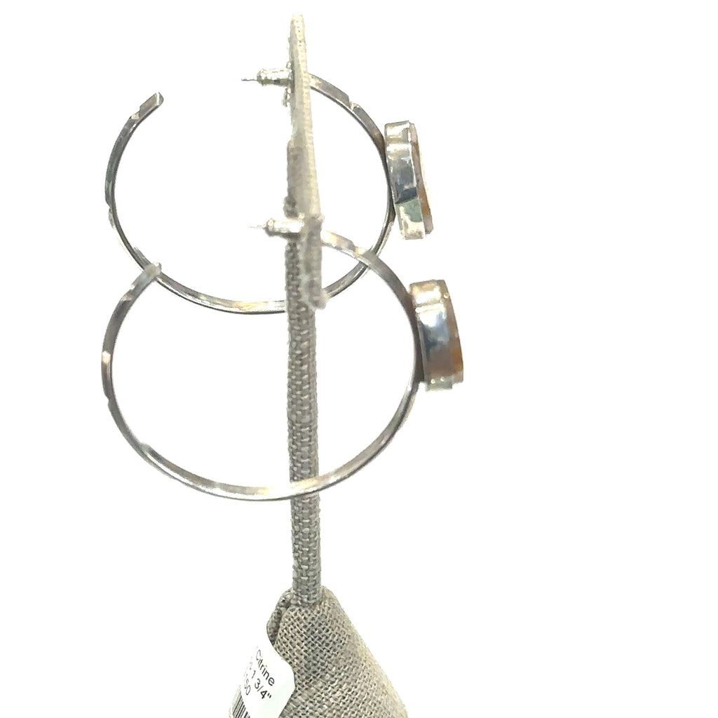 Raw slice citrine hoop studs, 1.75 inch diameter on white on earing tree for close up side view