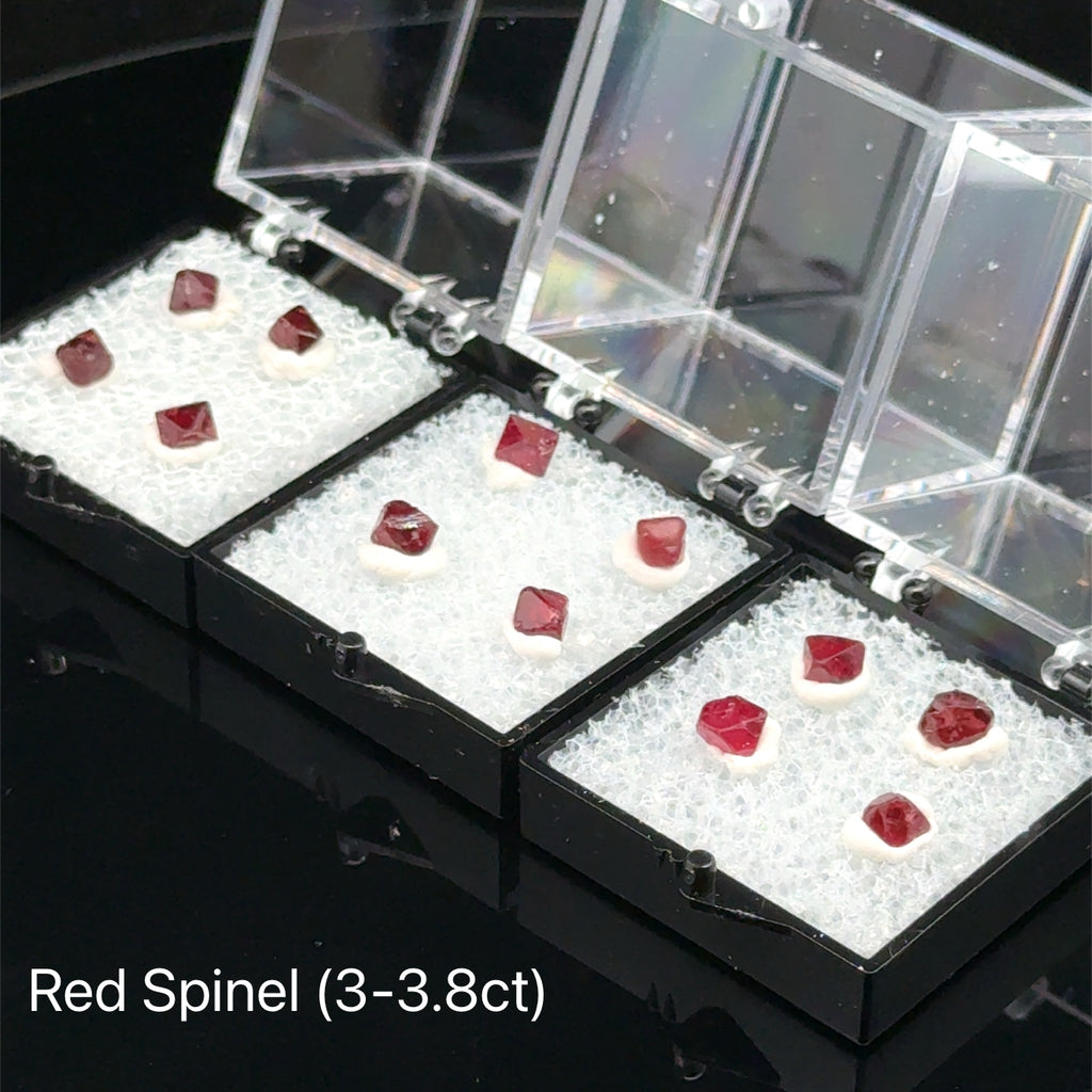 Red Spinel Raw Gemstone Crystals in boxes Frontal