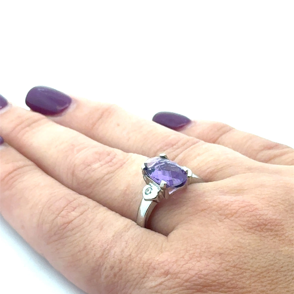  Ethical gemstone jewelry handcrafted with silver and Regal Amethyst in Boston- hand view
