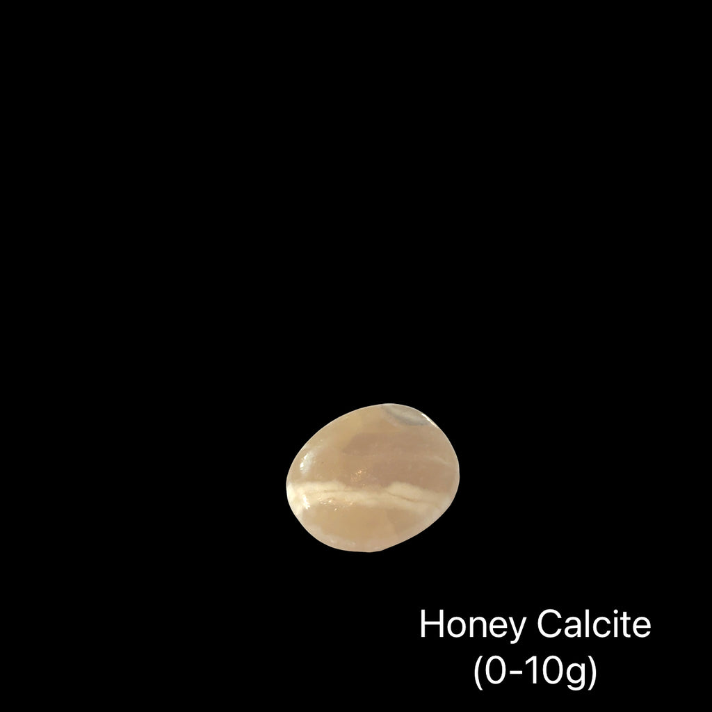 Reiki-charged Honey Calcite crystal for mental clarity and confidence, on a black background, (0-10g) front view.
