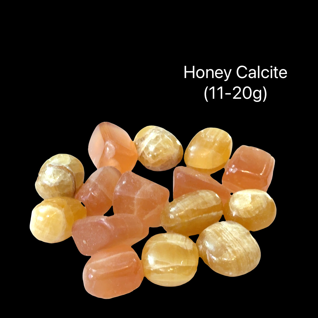 Reiki-charged Honey Calcite crystal for mental clarity and confidence, on a black background, (11-20g) front view.