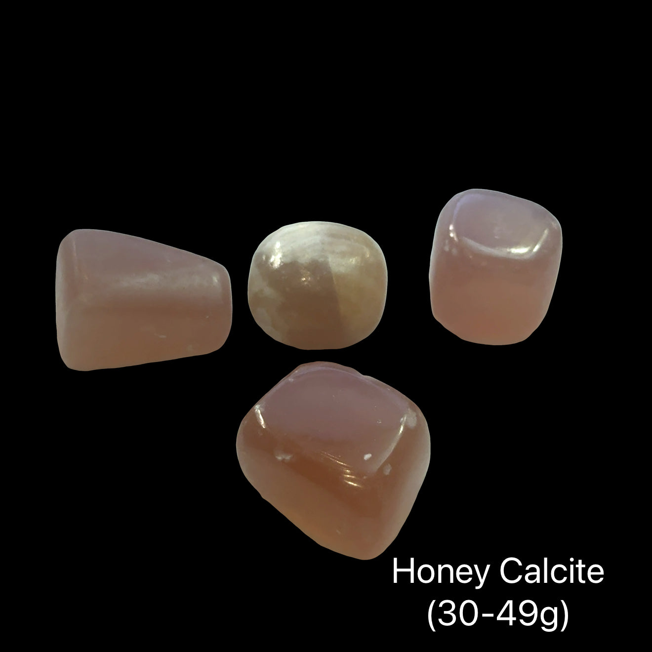 Reiki-charged Honey Calcite crystal for mental clarity and confidence, on a black background, (30-49g) front view.
