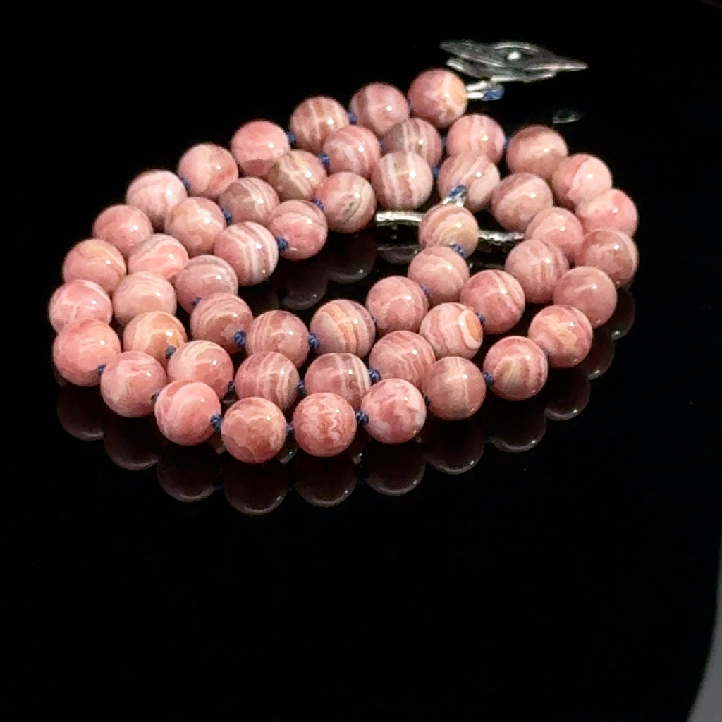 Rhodochrosite Gemstone Necklace on black back
