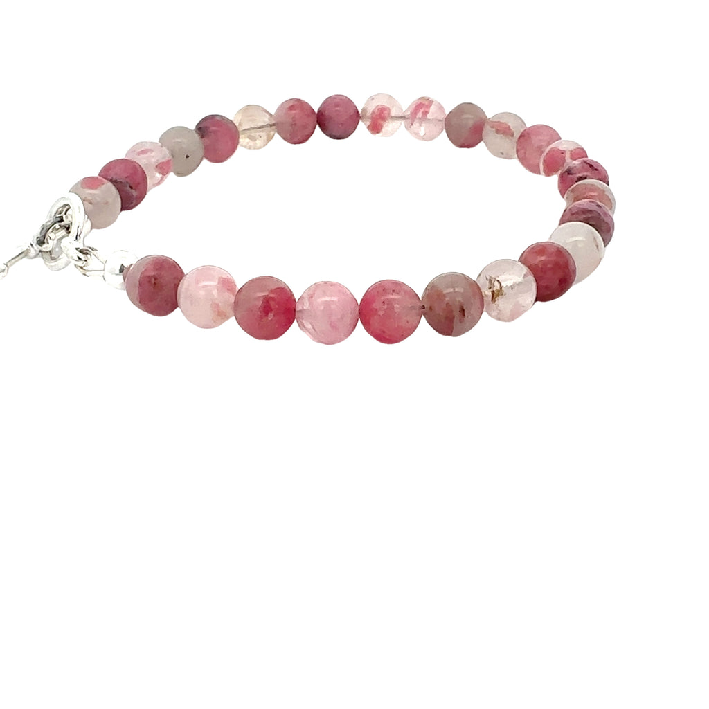 Rhodonite in Quartz Gemstone Bracelet on white left side overview