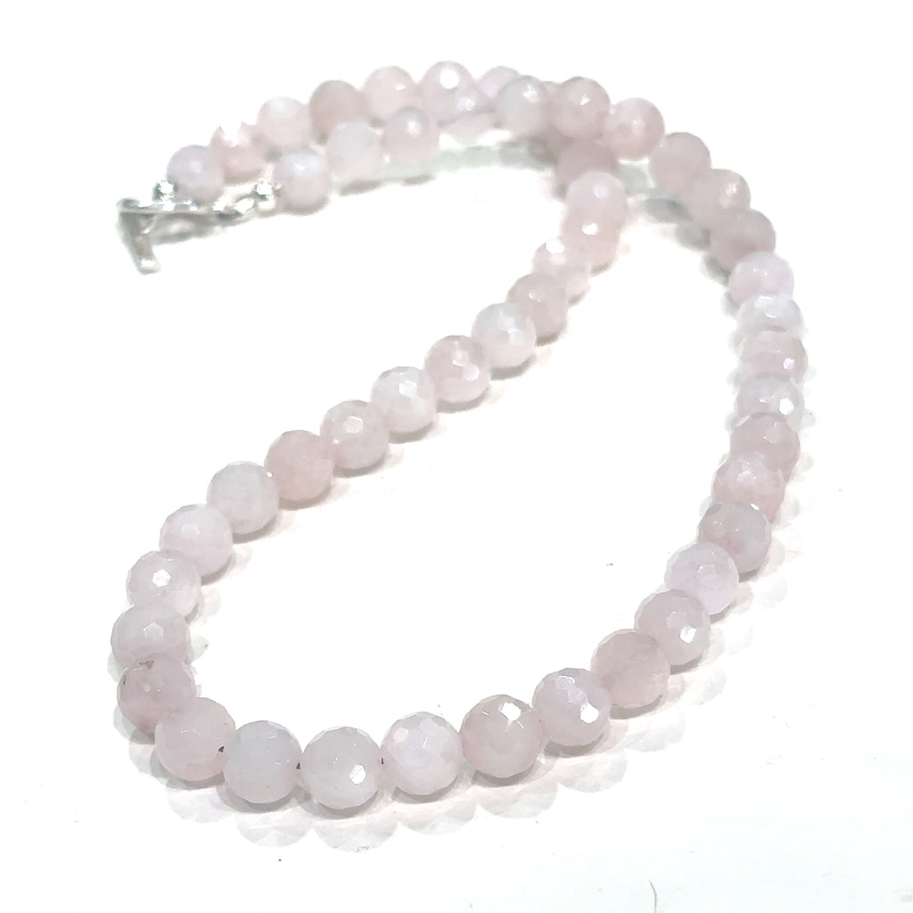 Rose Quartz crystal jewelry for heart chakra alignment and unconditional love on white long center overview