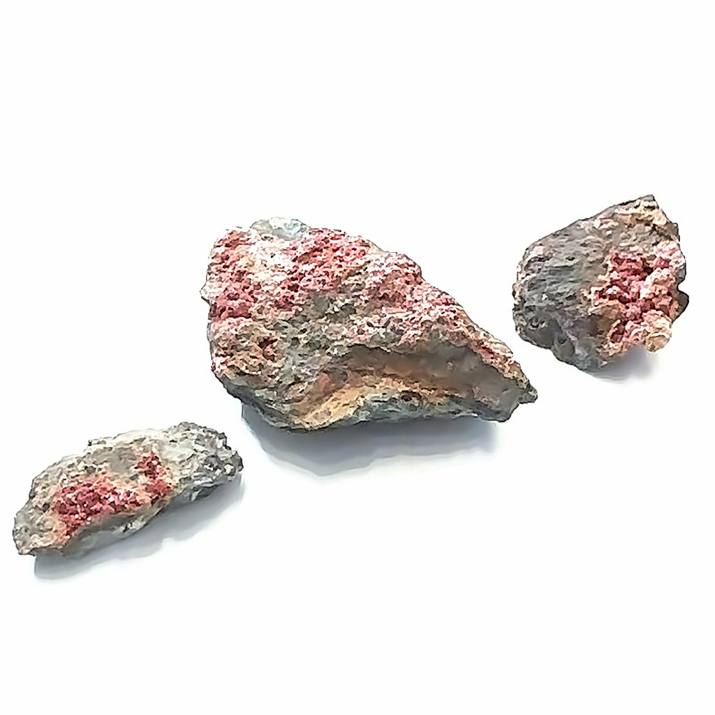 Roselite Raw Gemstone from Morocco grouping on white overview