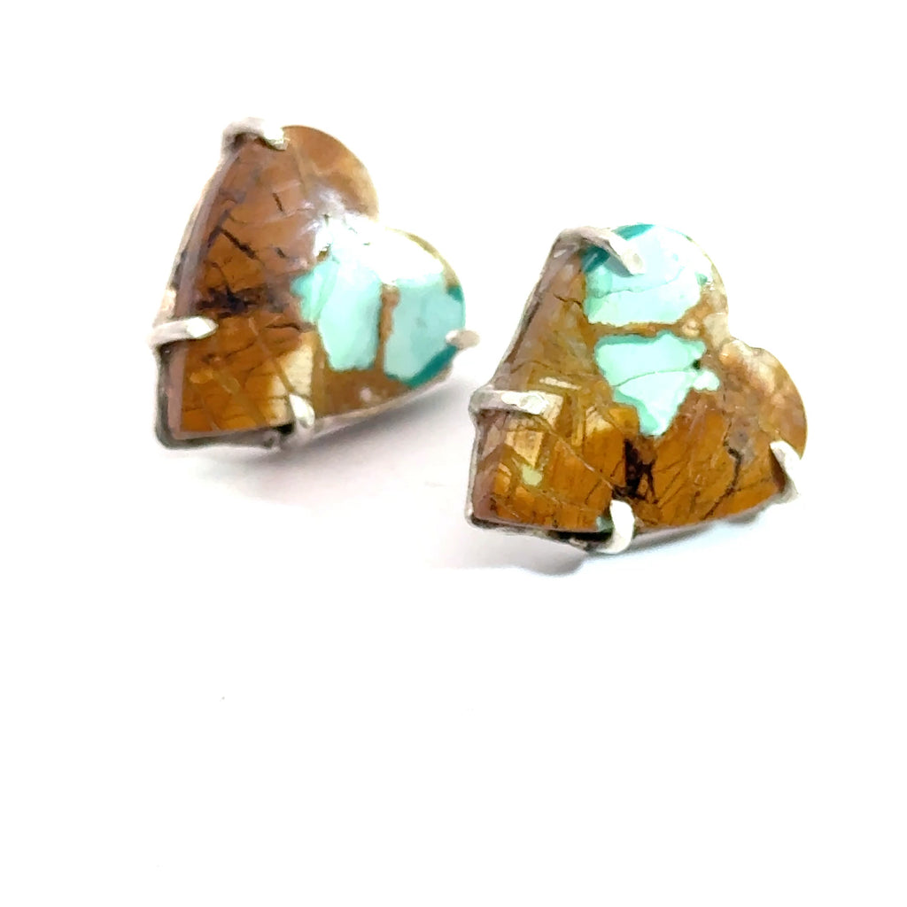 Royston Turquoise heart earrings in sterling silver — handcrafted by Hidden Jewel Boston on a white background left angle front close up view. 