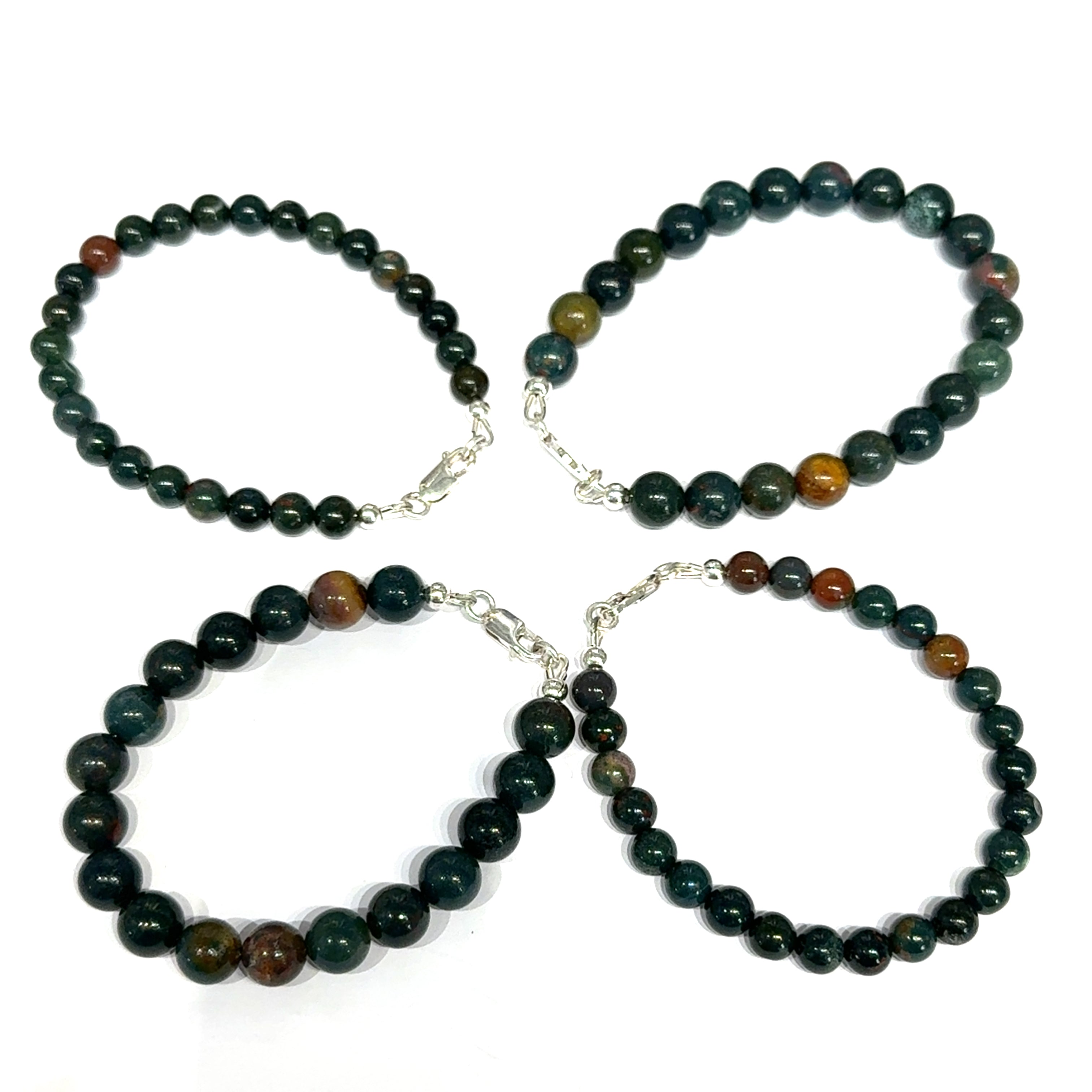 Set of four Bloodstone gemstone beaded bracelets on a white background, front overview. 