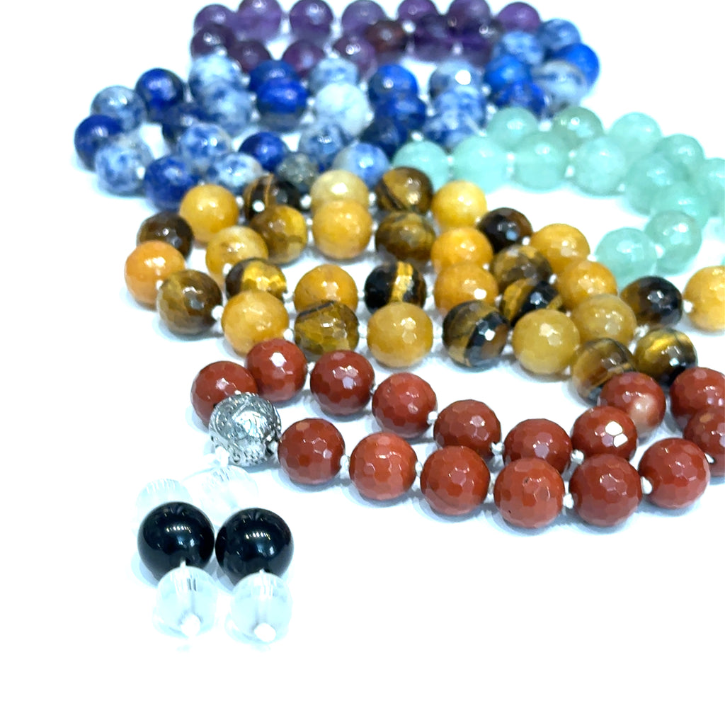 Seven Chakra Mala Necklace on white long front close up overview