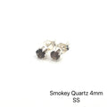 Smokey Quartz earrings with a silver setting on a white background, front facing left angle front overview. 