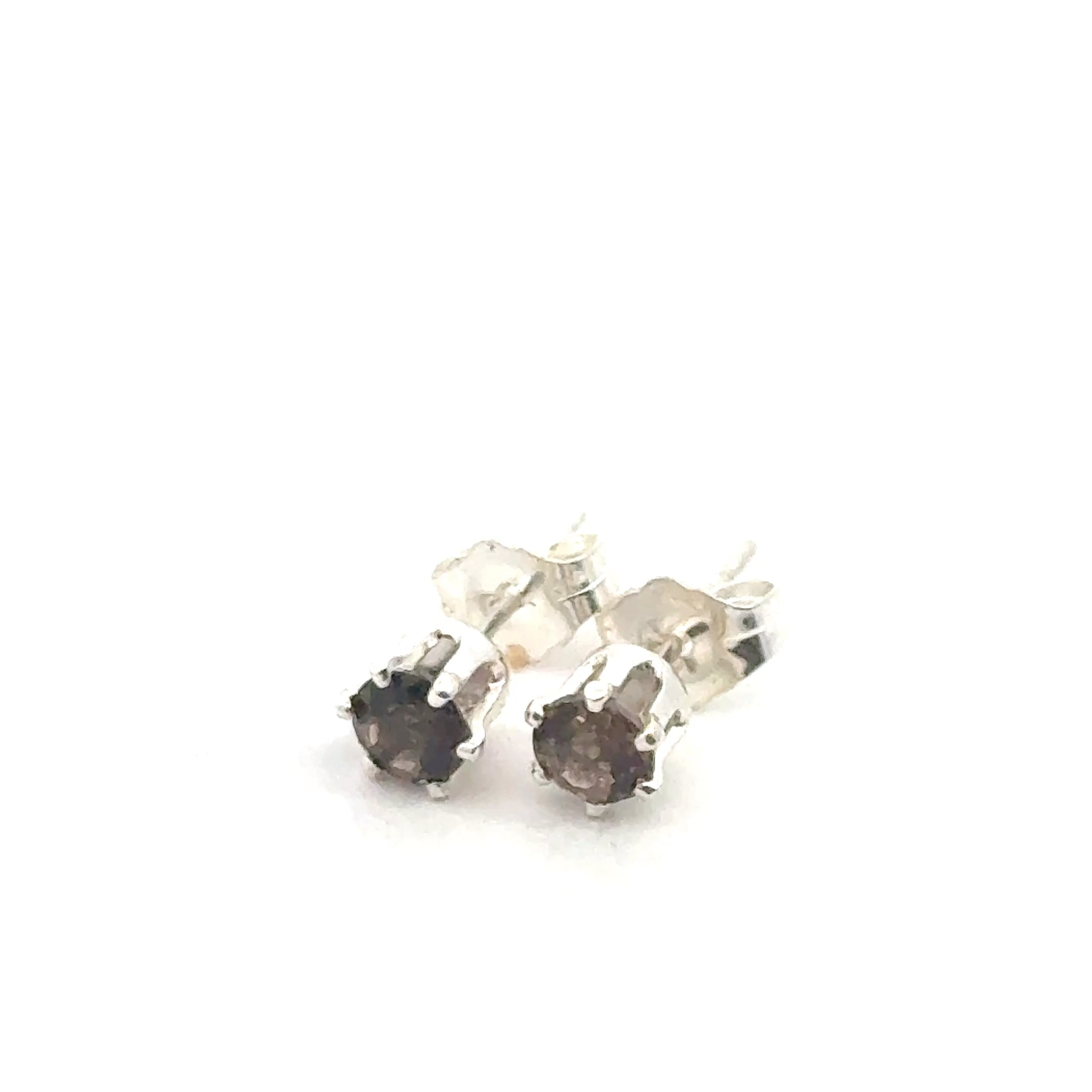Smokey Quartz earrings with a silver setting on a white background, front overview. 