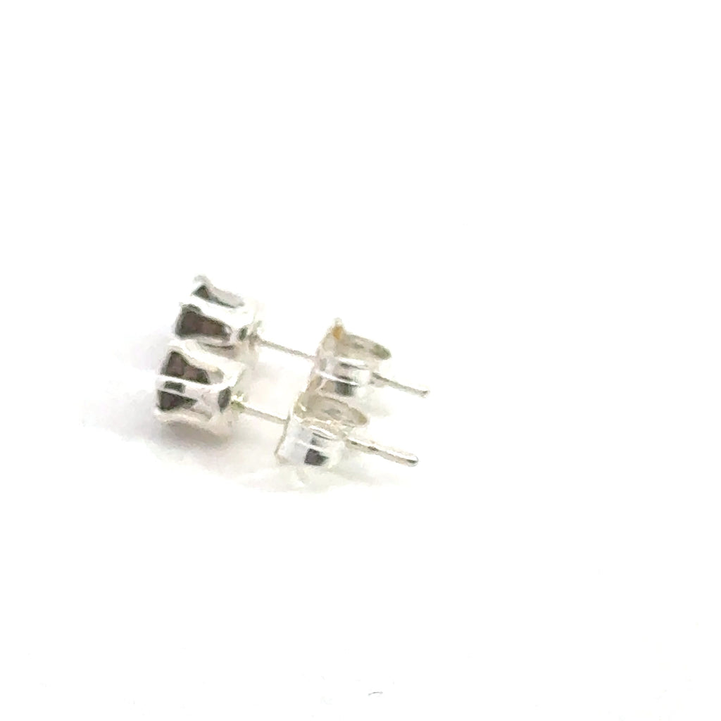 Smokey Quartz earrings with a silver setting on a white background, right side overview. 