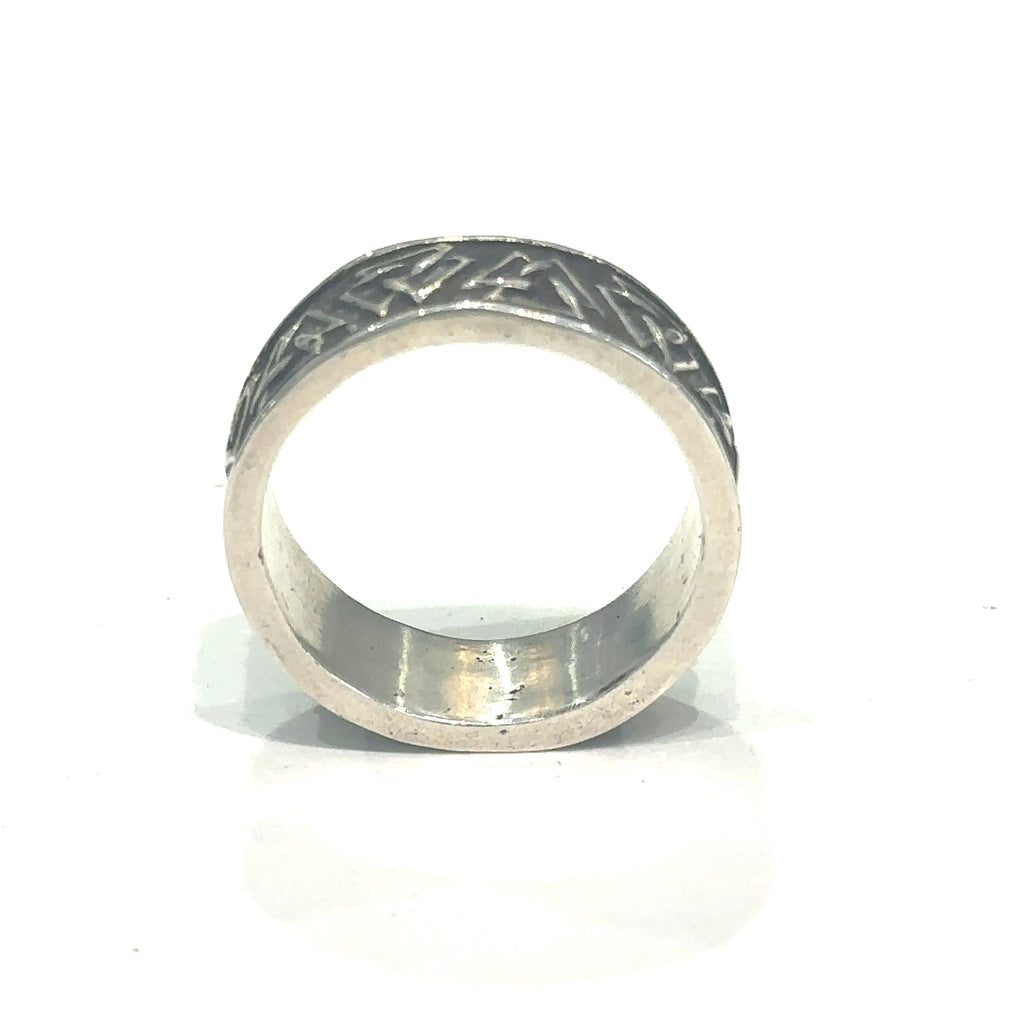Statement men’s silver ring with geometric triangle symbolism on white side view