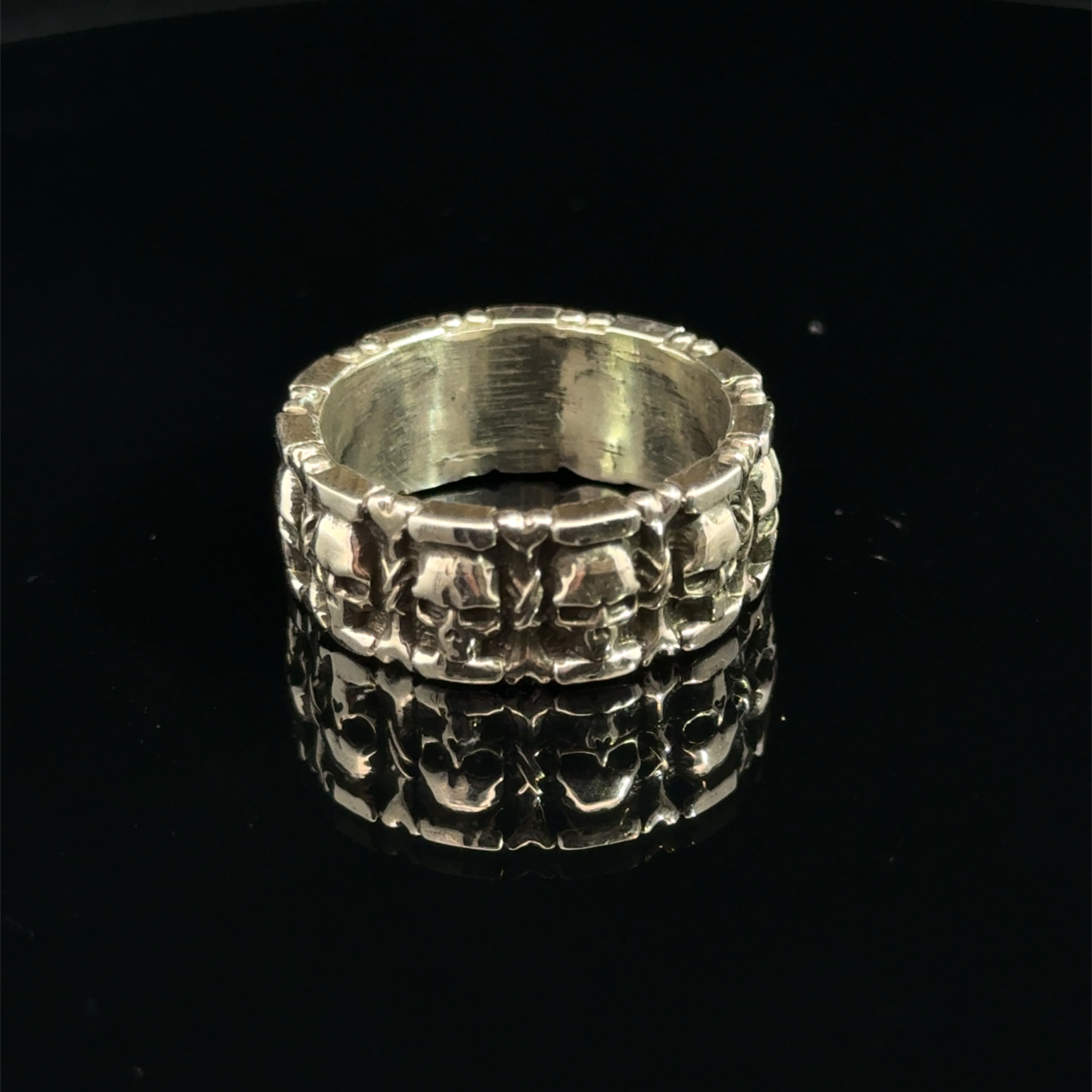 Sterling Silver Skull and Bones Ring on black  back side