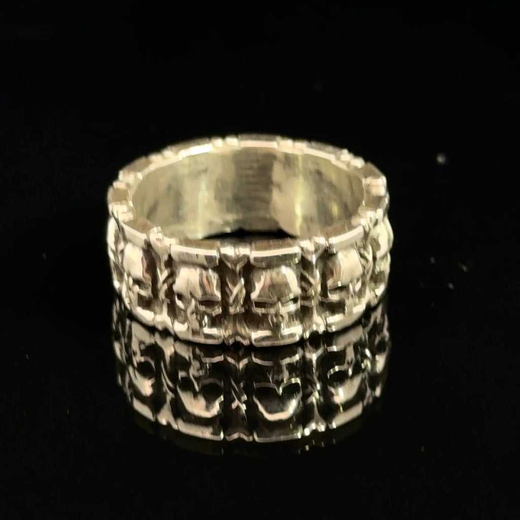 Sterling Silver Skull and Bones Ring on black  left side