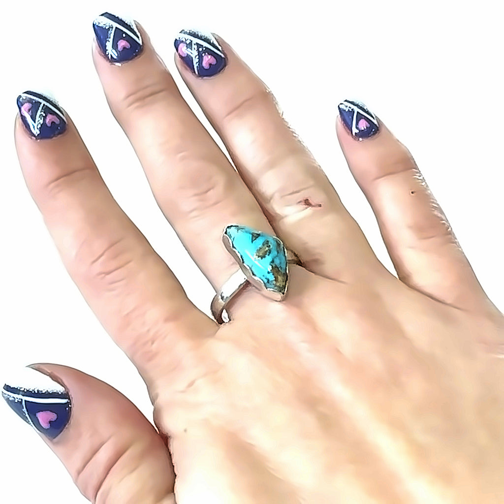 Sterling Silver Turquoise Ring on white  and on ring finger flat, front, & center overview