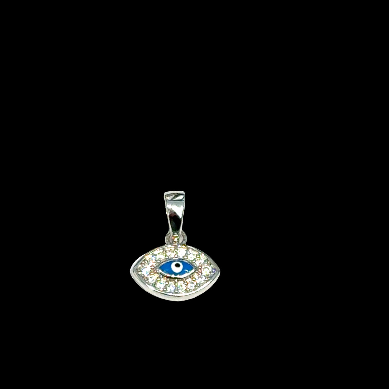 Sterling silver evil eye pendant with sparkling pavé cubic zirconia stones on a black background, front overview.