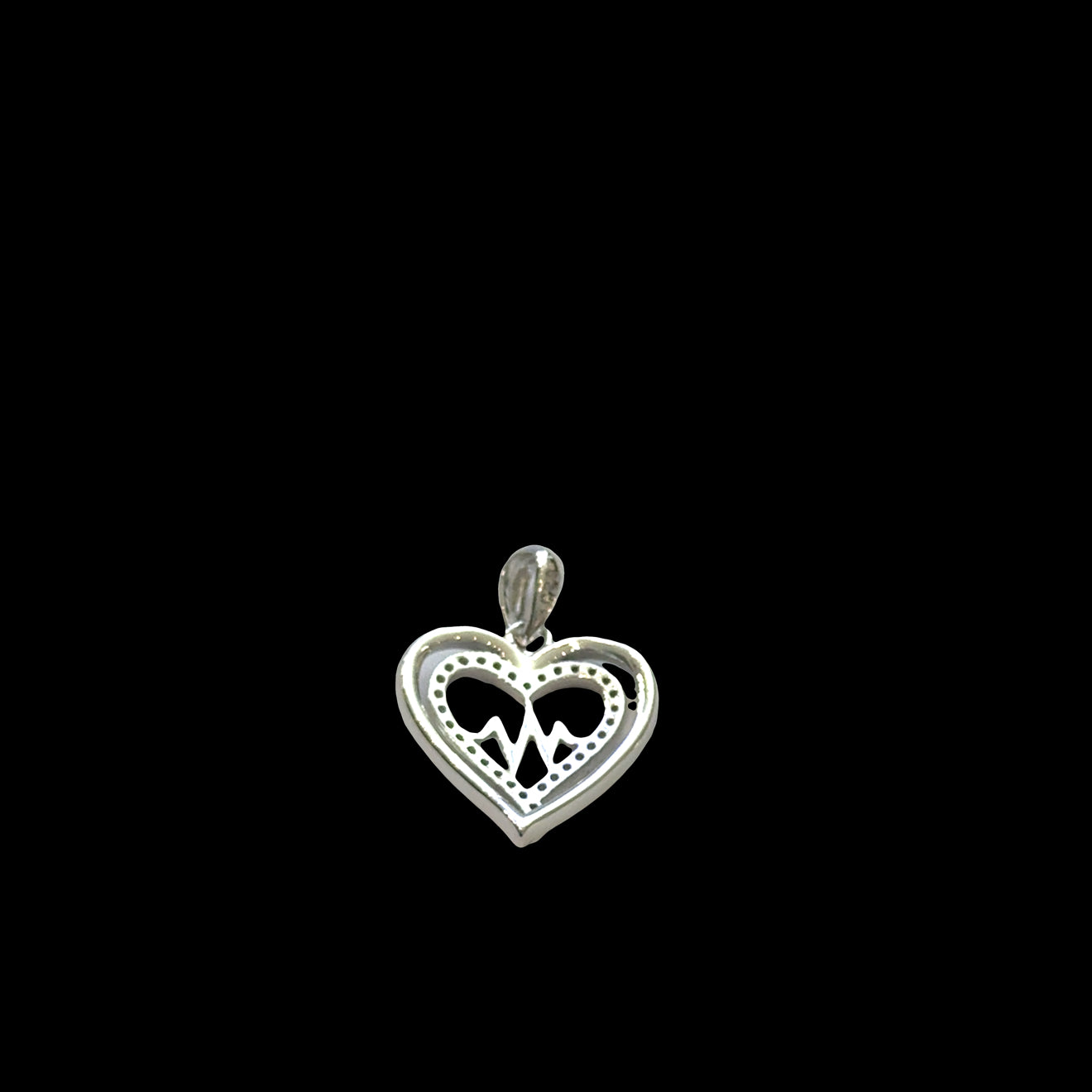 Sterling silver heartbeat pulse heart pendant with CZ accents, EKG line design, life force vitality jewelry, on a black background, back view.