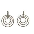 Sterling silver triple concentric circle stud earrings with three diamond accents on bar post on a white background, front view.
