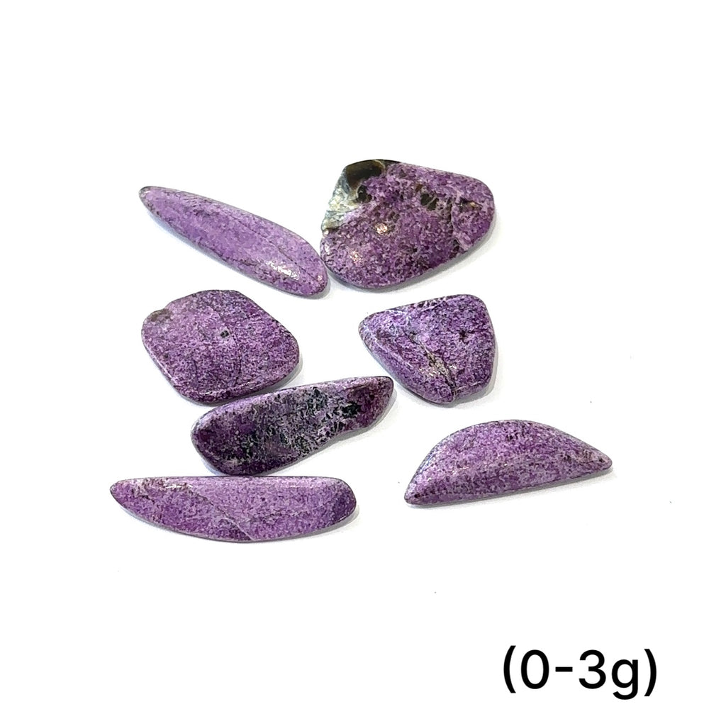 Stichtite gemstone with soft lilac and plum tones symbolizing stress relief and self-growth (0-3g) on white overview