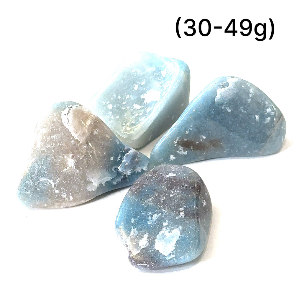 Stone of Ascension Trolleite crystal for throat and crown chakra alignment (30-49g) grouping on white front overview