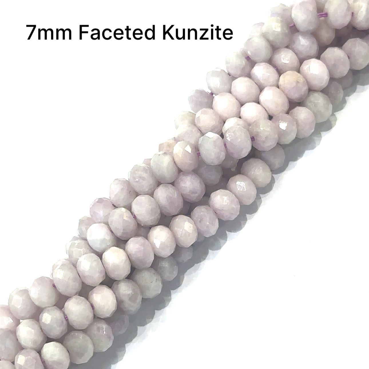Strand of Kunzite 7mm faceted roundel on a white background, front view.