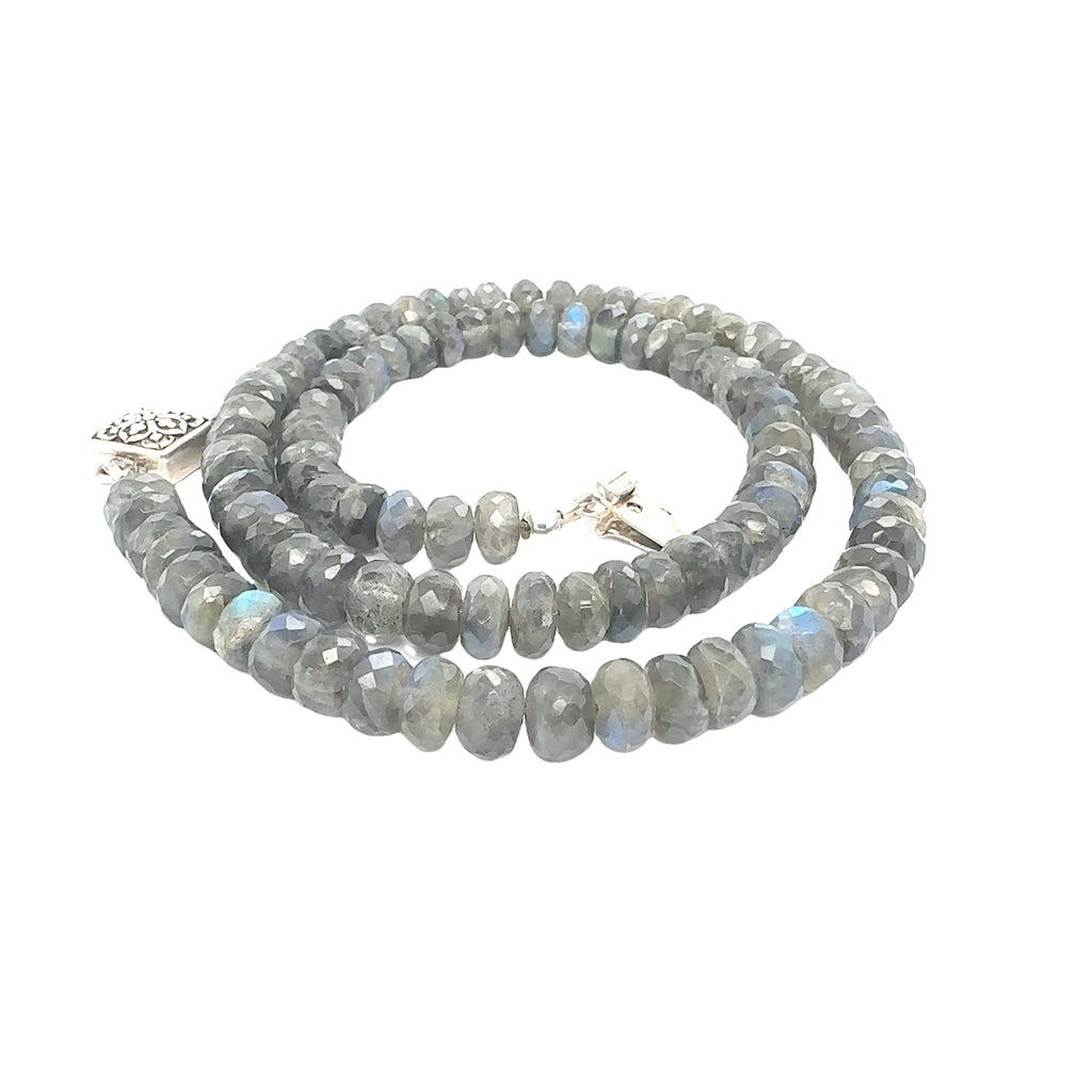 Stunning 7mm faceted Labradorite gemstone beaded necklace with sterling silver box clasp, 18.25 inches on white spiral overview
